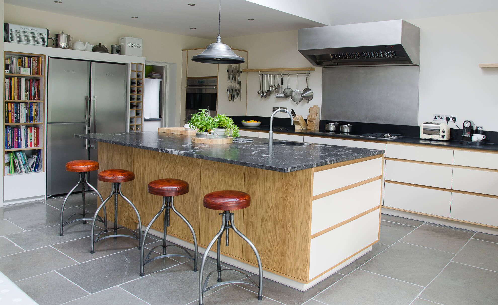 Heath Drive large hand made bespoke kitchen with birch plywood and laminate fronts, marble worktops and oak details made in Whitstable, Kent.